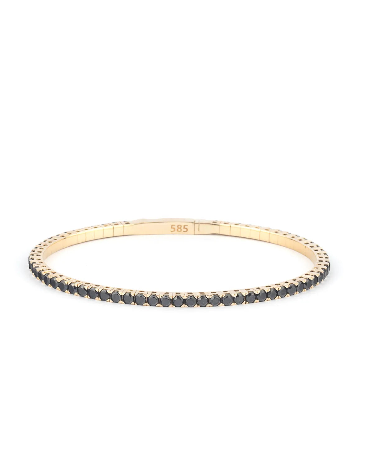 A close-up of an Onyx tennis bracelet in gold, highlighting its refined craftsmanship and elegant appeal.