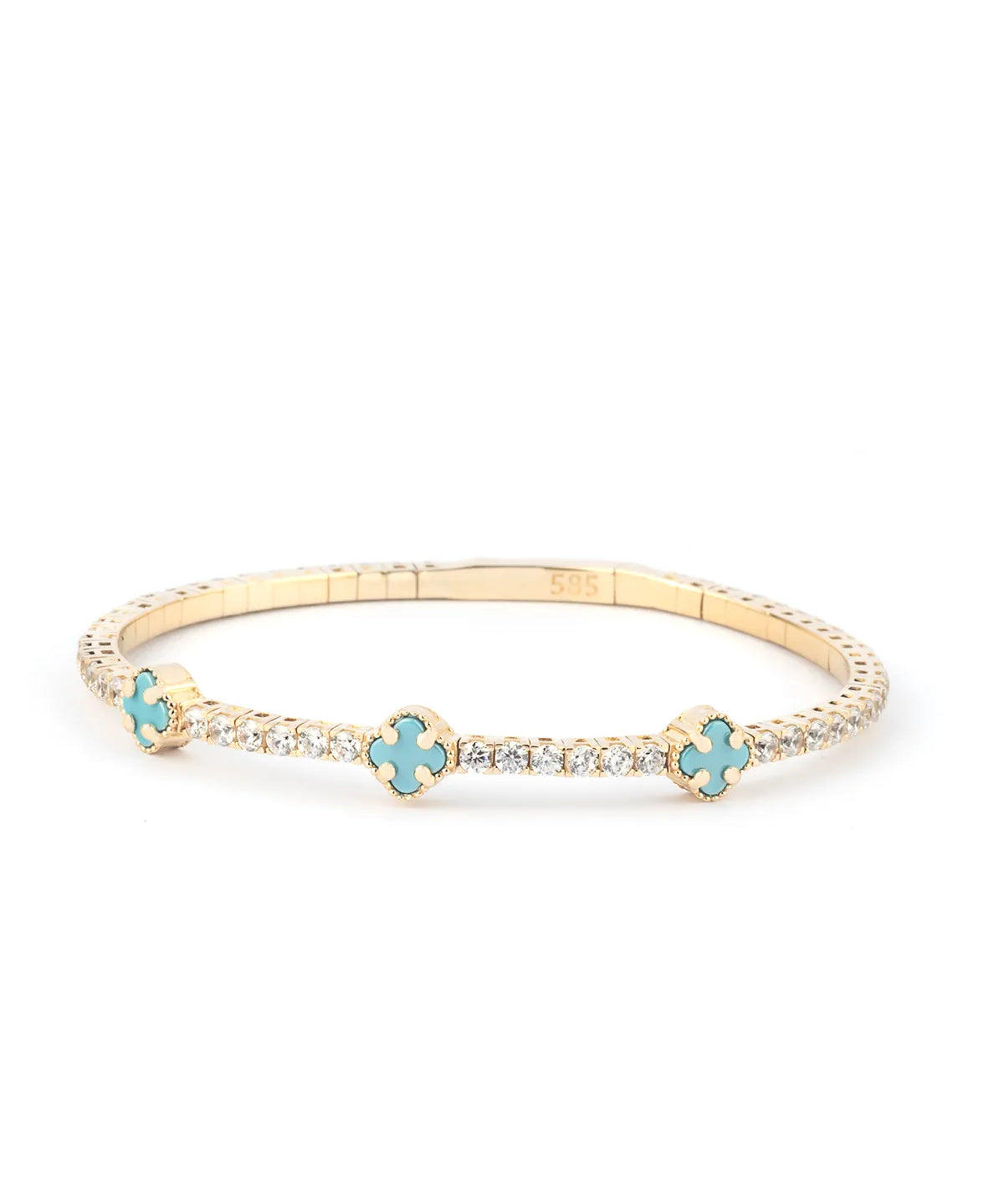 A stunning close-up of a turquoise crystal and 14K gold bracelet worn on a wrist, showcasing its refined elegance.