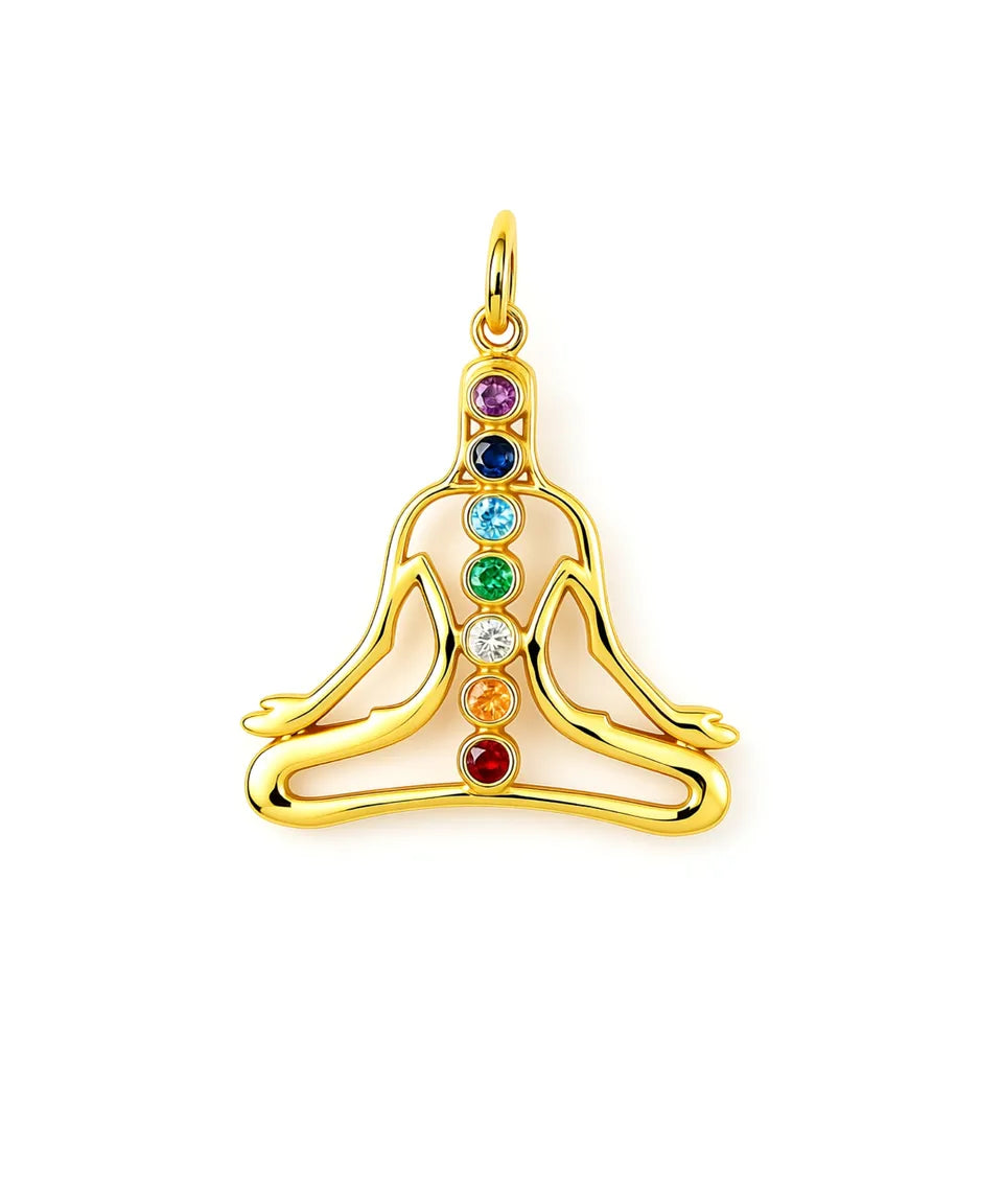 Gold pendant with colorful gemstones on a white background