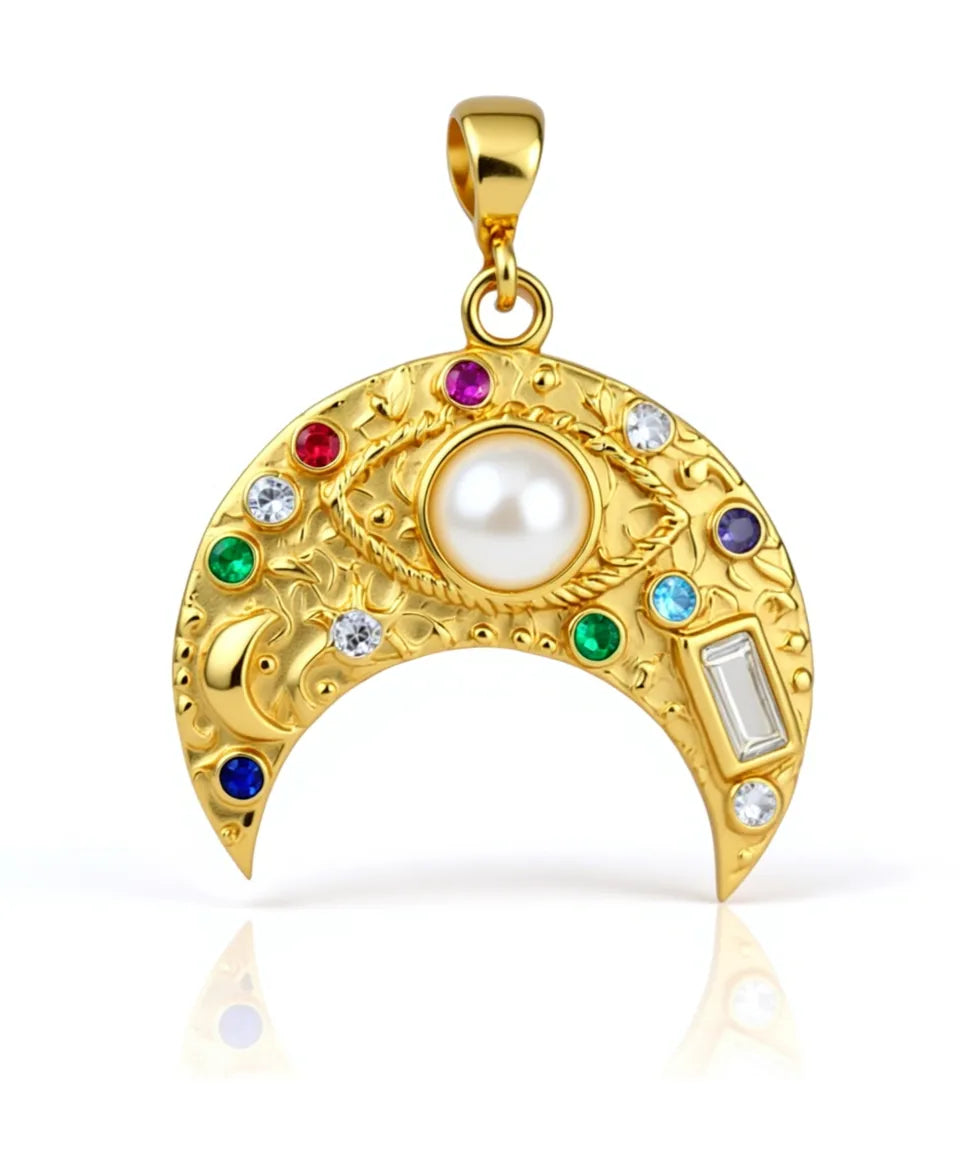 Gold crescent moon pendant with pearls and gemstones on a white background