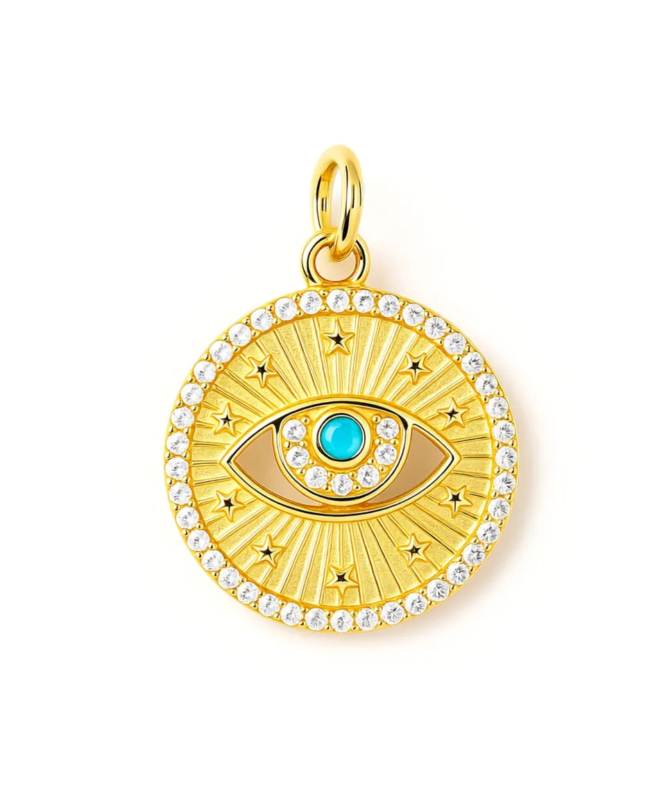 Gold pendant with eye design and turquoise center on a white background
