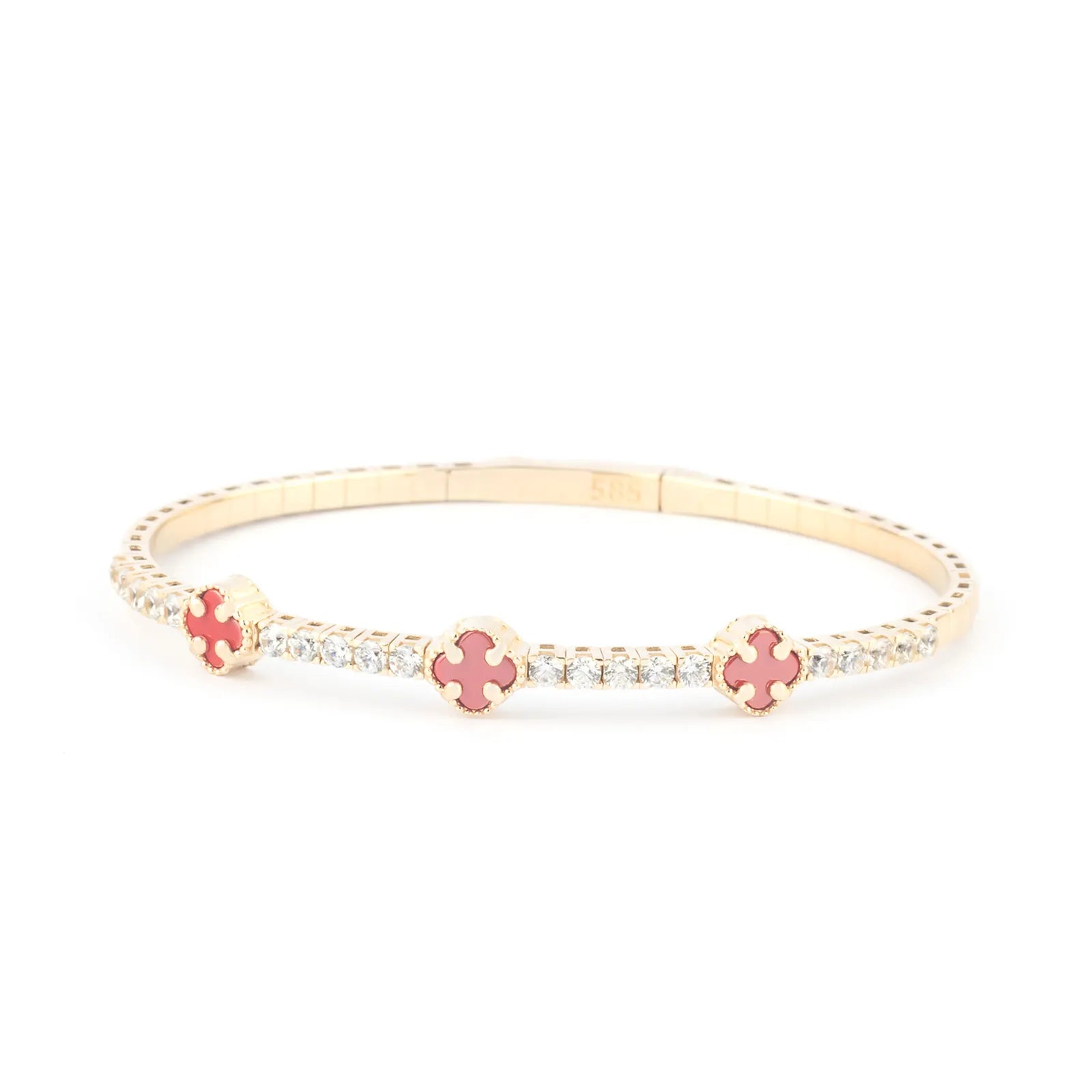 A luxurious gold tennis bracelet with sparkling diamonds and clover-shaped enamel charms in red and green, adding a refined touch to any outfit."
