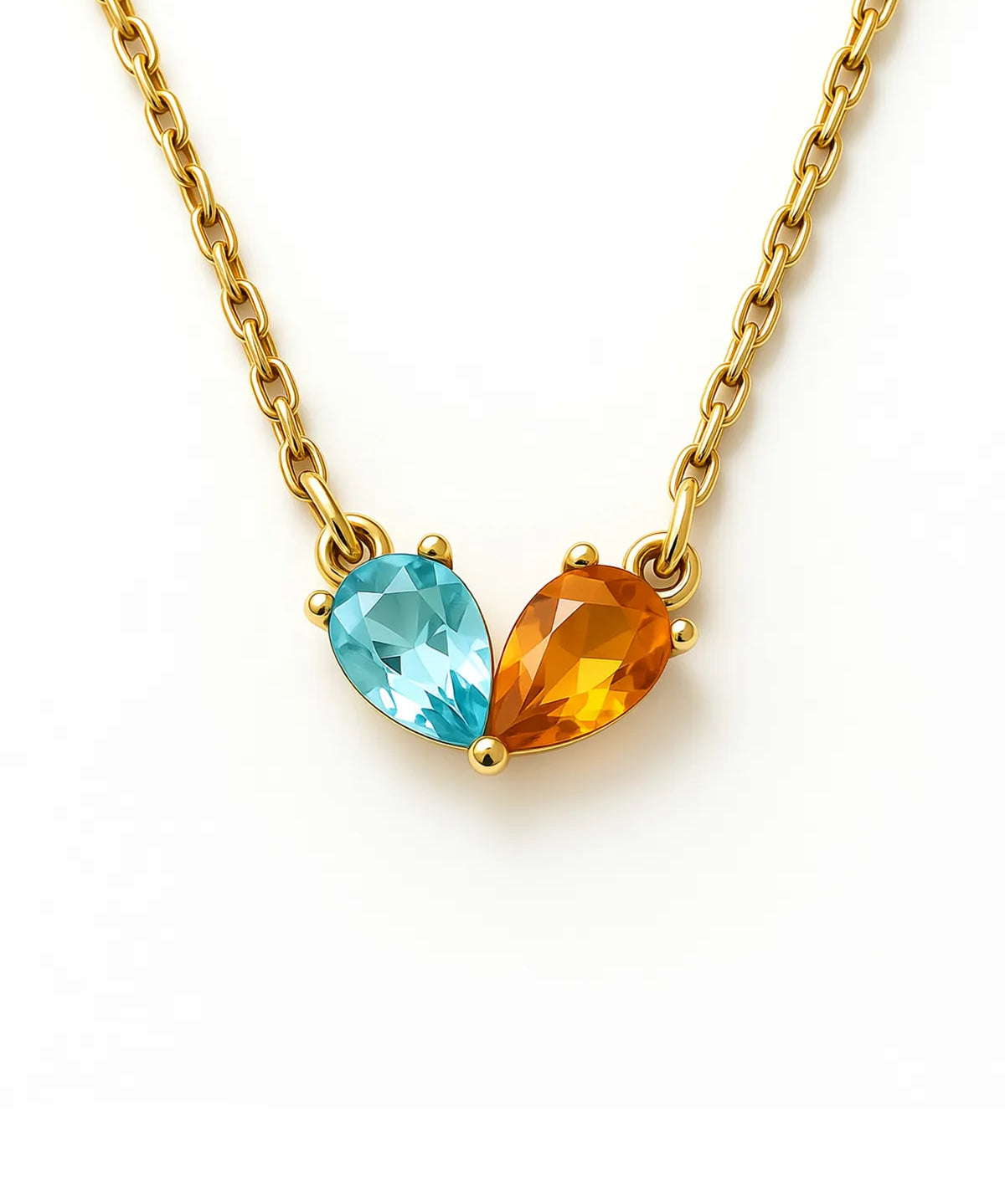 Gold necklace with a blue and orange gemstone on a white background