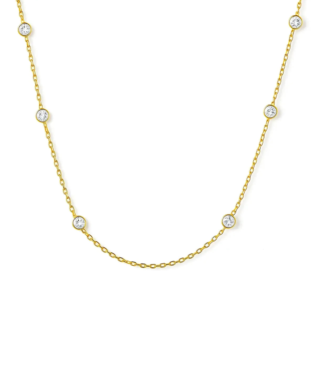 a gold bezel station necklace with diamonds or cubic zirconia accents. 