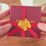 A dense collage of text and patterns.| MyJewelist