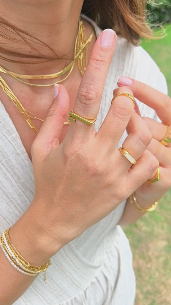 gold stacked rings on women and showcase a style