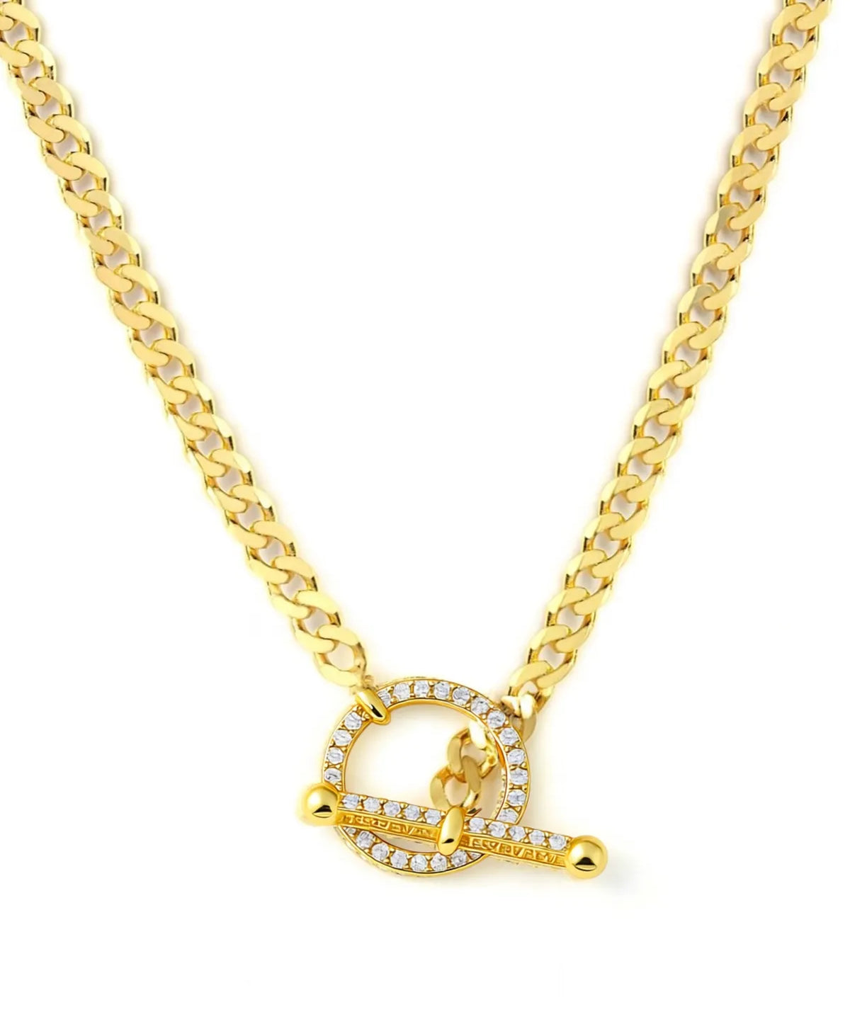 Gold necklace with a heart-shaped clasp on a white background